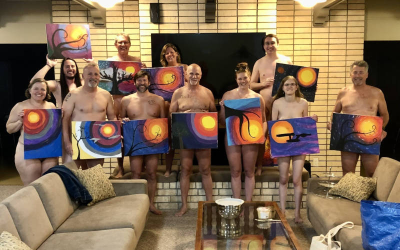 People relaxing, some clothed some not